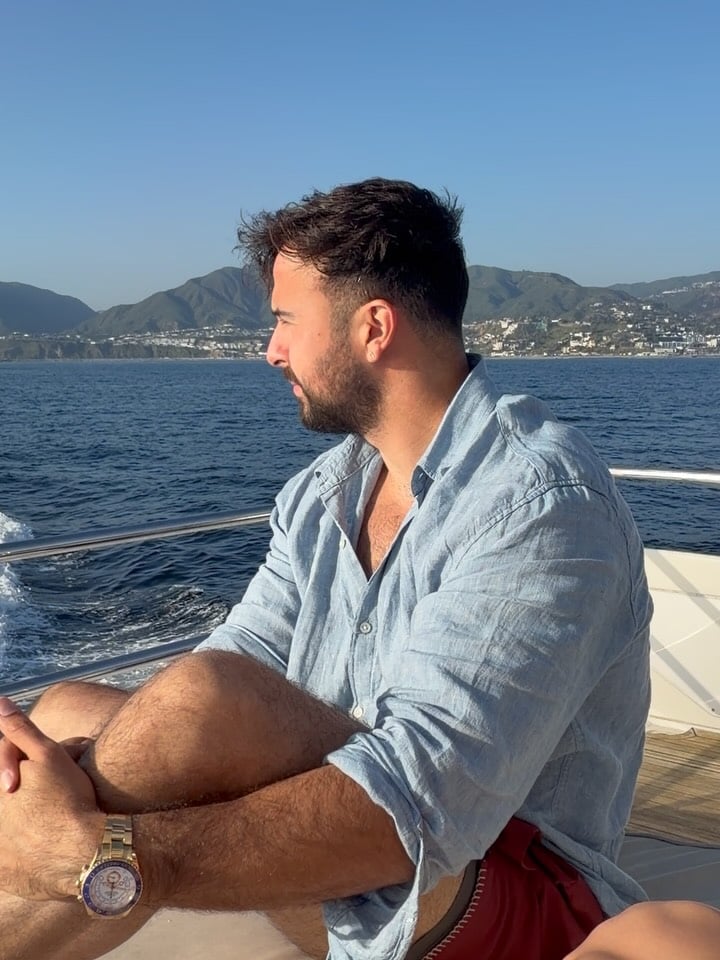 Marczell Klein on a yacht, Mediterranean coastline