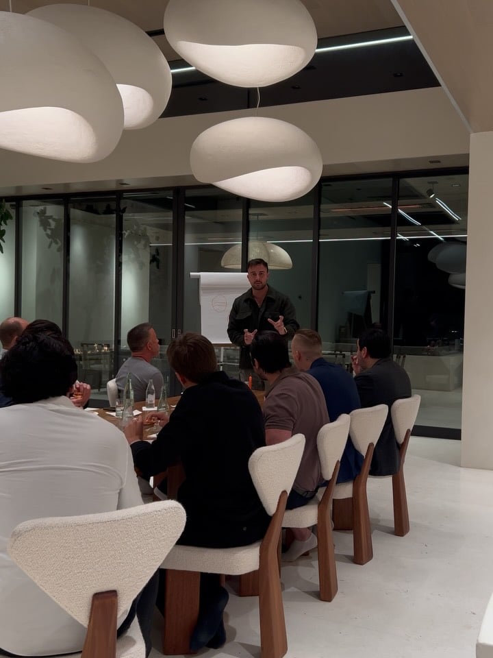 Marczell Klein addressing a private mastermind dinner