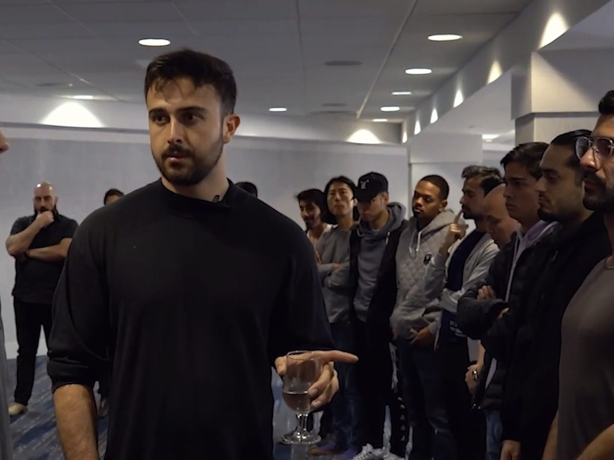 Marczell Klein standing among a group of members at an event.