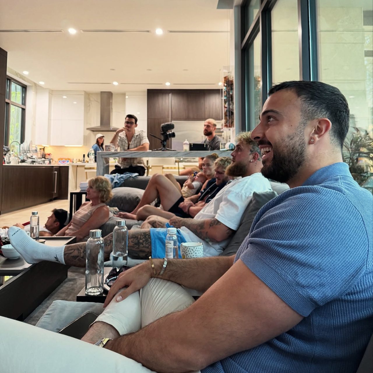 Guests relaxing in the living room at Jake Paul's home in Costa Rica.